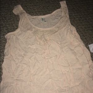 White floral scoop neck sleeveless top